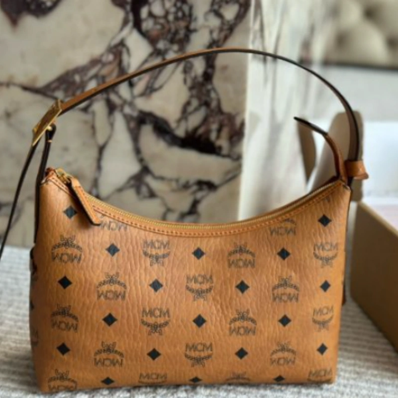 5c8c9e39b0fdb5f81e72471ec491f135 MCM New Croissant Bag Carry Armpit Bag (With Gift Box) - Image 1