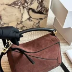 Geometric bag puzzle with box suede