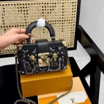 It can be carried by hand or cross-body and is full of diamond box bags-box - Image 9