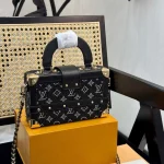 It can be carried by hand or cross-body and is full of diamond box bags-box - Image 5