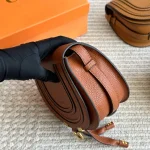 Classic saddle silhouette with full-grain soft leather-box - Image 7