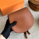 Classic saddle silhouette with full-grain soft leather-box - Image 6