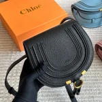 Classic saddle silhouette with full-grain soft leather-box