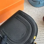 Classic saddle silhouette with full-grain soft leather-box - Image 9