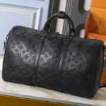 Black leather travel bag, sold without box.