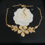 Celebrate Success: Double C Wheat & Floral Necklace – An Opulent Accessory for the Modern Woman-box