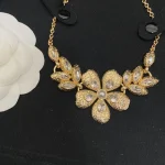 Celebrate Success: Double C Wheat & Floral Necklace – An Opulent Accessory for the Modern Woman-box - Image 4