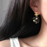Blue Double-C Planet Universe Stud Earrings-box - Image 10