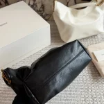 Classic black tone meets the iconic Y-signature V-shaped quilting-box - Image 7