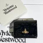 Black and gold patent leather embossed wallet-box