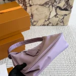 This nylon underarm bag features a multi-color design and is super convenient and comfortable-box - Image 7