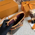 Monogram Mini Bucket Bag: A Vintage Lover's Dream Bag-box - Image 5