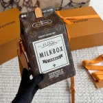 The monogram transforms into a soft, milk-carton style package-box