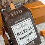 The monogram transforms into a soft, milk-carton style package-box - Image 10