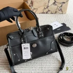 Vintage biker bag with distressed hardware-box