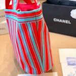 Tote bag style with red and blue contrast stripes, front embroidery, and red leather top handles-no box - Image 4