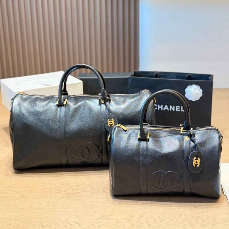 13427363568346000 Black and gold Boston bag with front embossed CC logo, gold lock, and round leather tag-no box - Image 1