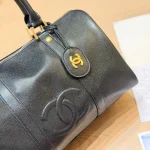 Black and gold Boston bag with front embossed CC logo, gold lock, and round leather tag-no box - Image 8