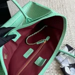 Glossy crocodile-embossed leather tote, featuring a stunning vintage gold double-C lock-box - Image 4
