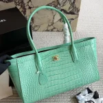 Glossy crocodile-embossed leather tote, featuring a stunning vintage gold double-C lock-box - Image 3