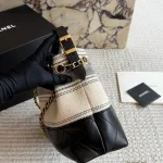 Striped bucket bag. Classic striped canvas with a metal chain-box - Image 8