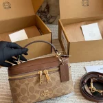 Box bag, classic monogram PVC with cowhide trim-box - Image 11