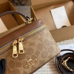 Box bag, classic monogram PVC with cowhide trim-box - Image 9