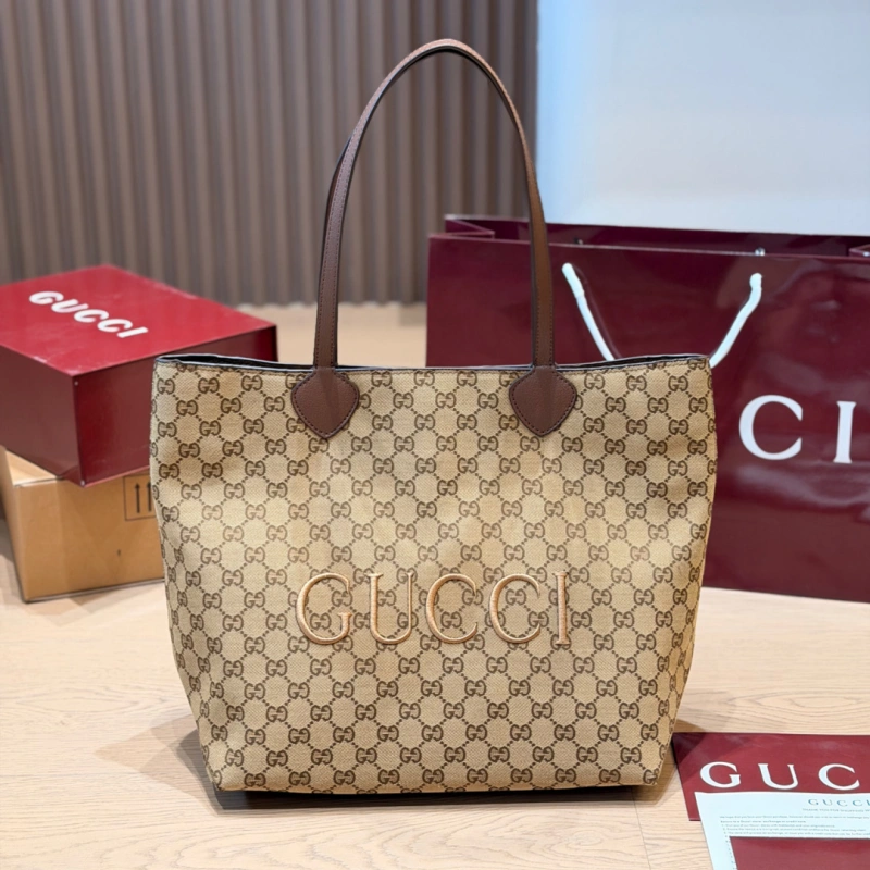13428140214793200 Large tote bag featuring floral canvas and red & green striped webbing, with brown leather handles-no box - Image 1