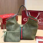 Fabric featuring the iconic green-red-green web stripe, paired with brown leather handles and a detachable shoulder strap-no box - Image 2