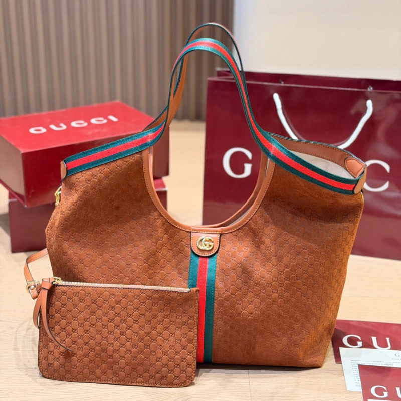13428384306484400 Fabric featuring the iconic green-red-green web stripe, paired with brown leather handles and a detachable shoulder strap-no box - Image 1