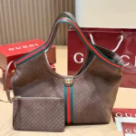 Fabric featuring the iconic green-red-green web stripe, paired with brown leather handles and a detachable shoulder strap-no box - Image 13
