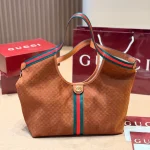 Fabric featuring the iconic green-red-green web stripe, paired with brown leather handles and a detachable shoulder strap-no box - Image 11