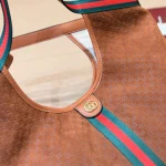 Fabric featuring the iconic green-red-green web stripe, paired with brown leather handles and a detachable shoulder strap-no box - Image 8