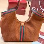 Fabric featuring the iconic green-red-green web stripe, paired with brown leather handles and a detachable shoulder strap-no box - Image 7