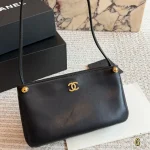 Accented with a metal double-C logo and a gold pearl strap, it’s effortlessly chic and sophisticated-box