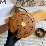 Classic mini round bag with a vintage circular silhouette that is simply chic-box