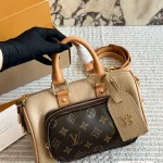 L's Keepall pillow bag is an absolute cutie! Made of premium top-grain cowhide-box