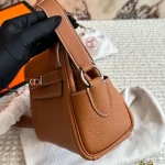 This Hermès Kelly messenger bag is made of genuine leather and has such a unique vibe with a premium feel-box - Image 11
