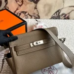 This Hermès Kelly messenger bag is made of genuine leather and has such a unique vibe with a premium feel-box - Image 9