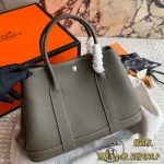 Garden Bag in premium Togo cowhide, incredibly soft to the touch. Features steel hardware, hand-stitched wrist strap, and authentic original lining-box - Image 3