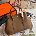 Garden Bag in premium Togo cowhide, incredibly soft to the touch. Features steel hardware, hand-stitched wrist strap, and authentic original lining-box - Image 14