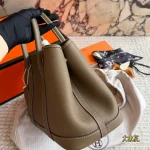 Garden Bag in premium Togo cowhide, incredibly soft to the touch. Features steel hardware, hand-stitched wrist strap, and authentic original lining-box - Image 12