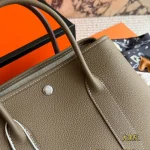 Garden Bag in premium Togo cowhide, incredibly soft to the touch. Features steel hardware, hand-stitched wrist strap, and authentic original lining-box - Image 11