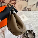 "Garden bag crafted from full-grain Togo cowhide, featuring a soft texture. Equipped with steel hardware, hand-stitched wrist strap, and original lining-box - Image 10
