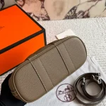 "Garden bag crafted from full-grain Togo cowhide, featuring a soft texture. Equipped with steel hardware, hand-stitched wrist strap, and original lining-box - Image 9