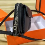 "Top-grain cowhide leather. This crossbody bag and handbag is crafted from premium calf leather, offering a delicate touch and lasting durability."-box - Image 17
