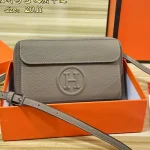 "Top-grain cowhide leather. This crossbody bag and handbag is crafted from premium calf leather, offering a delicate touch and lasting durability."-box - Image 9