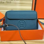 "Top-grain cowhide leather. This crossbody bag and handbag is crafted from premium calf leather, offering a delicate touch and lasting durability."-box - Image 6