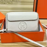 "Top-grain cowhide leather. This crossbody bag and handbag is crafted from premium calf leather, offering a delicate touch and lasting durability."-box - Image 5