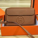 "Top-grain cowhide leather. This crossbody bag and handbag is crafted from premium calf leather, offering a delicate touch and lasting durability."-box - Image 4
